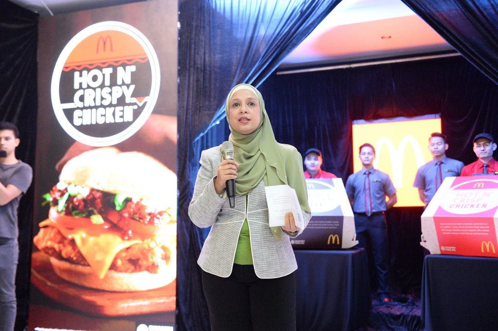 Pn. Melati Abdul Hai giving her speech at the launch of the Smoky Grilled Beef burger and Hot N’ Crispy Chicken burger.