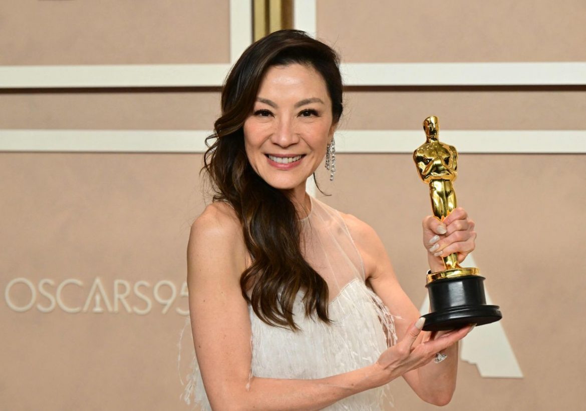 Malaysian actress Michelle Yeoh poses with the Oscar for Best Actress in a Leading Role for "Everything Everywhere All at Once" in the press room during the 95th Annual Academy Awards at the Dolby Theatre in Hollywood, California on March 12, 2023. (Photo by Frederic J. Brown / AFP)