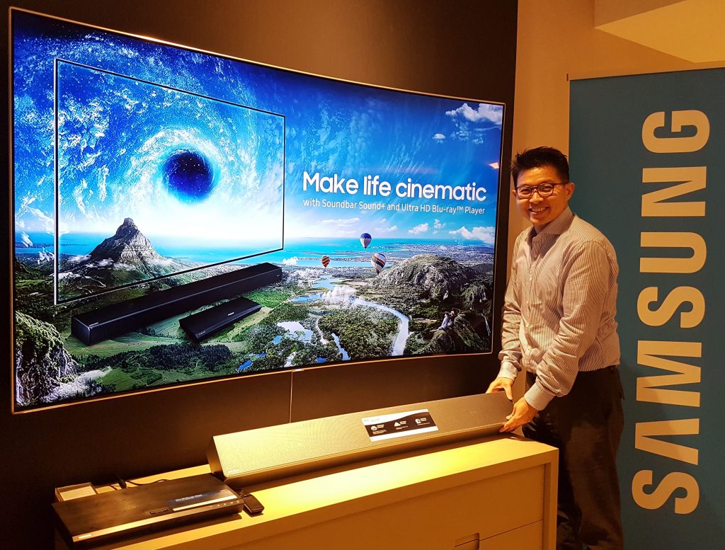 Jason Foo, Head of Audio Visual of Samsung Malaysia Electronic, proudly presents Samsung Soundbar (HW-MS751) alongside the QLEDTV and 4K Ultra HD Blu-ray Player.
