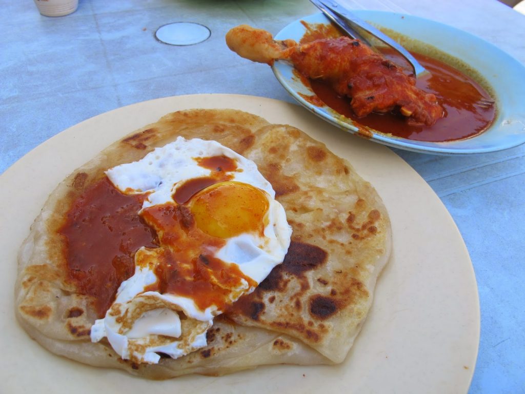 Fill your tummy up with breakfast from the famous Roti Canai Transfer Road (image via Michelle Nomms)